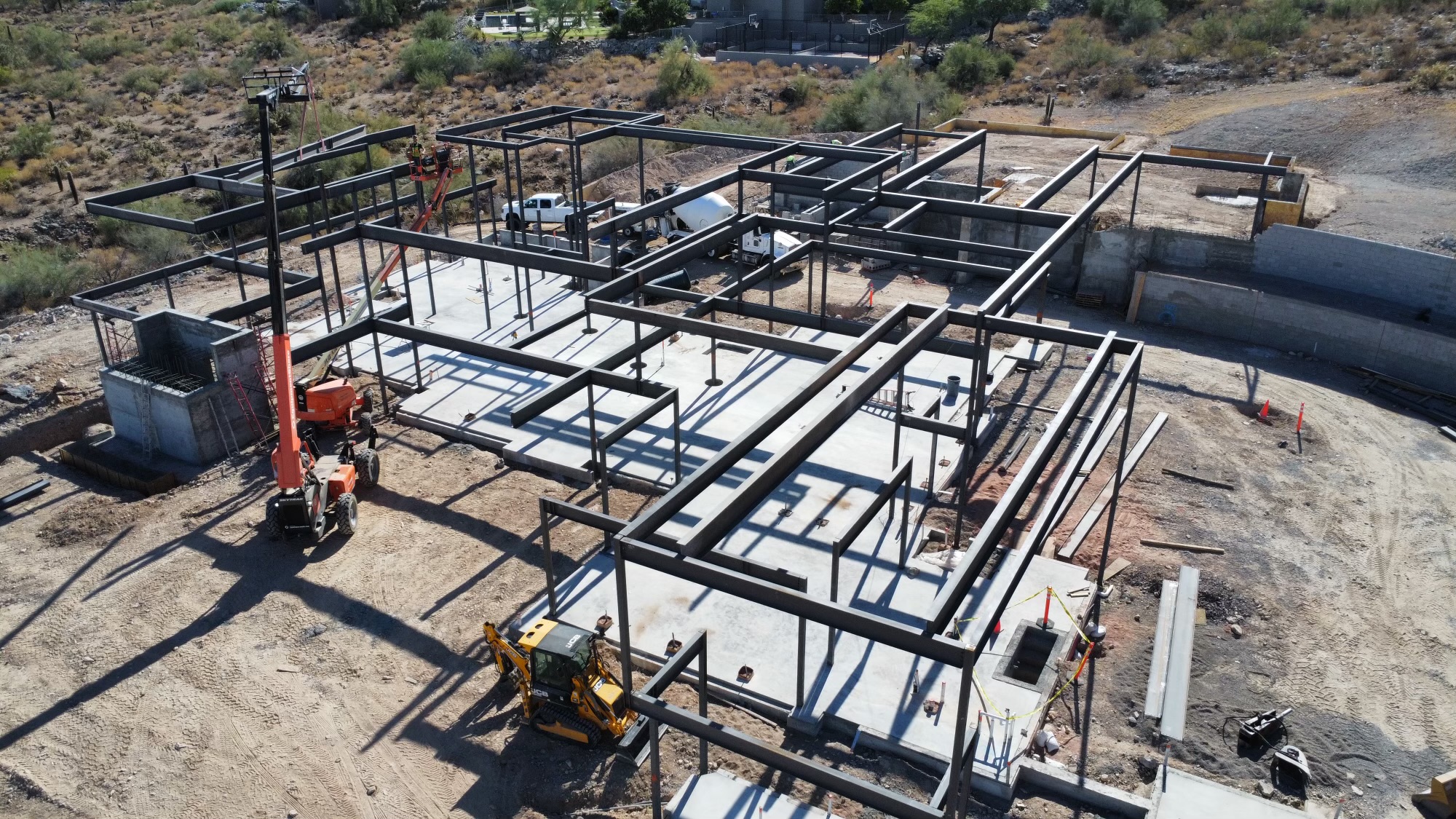 Aerial drone view of custom steel framing on concrete pad in Paradise Valley, Arizona